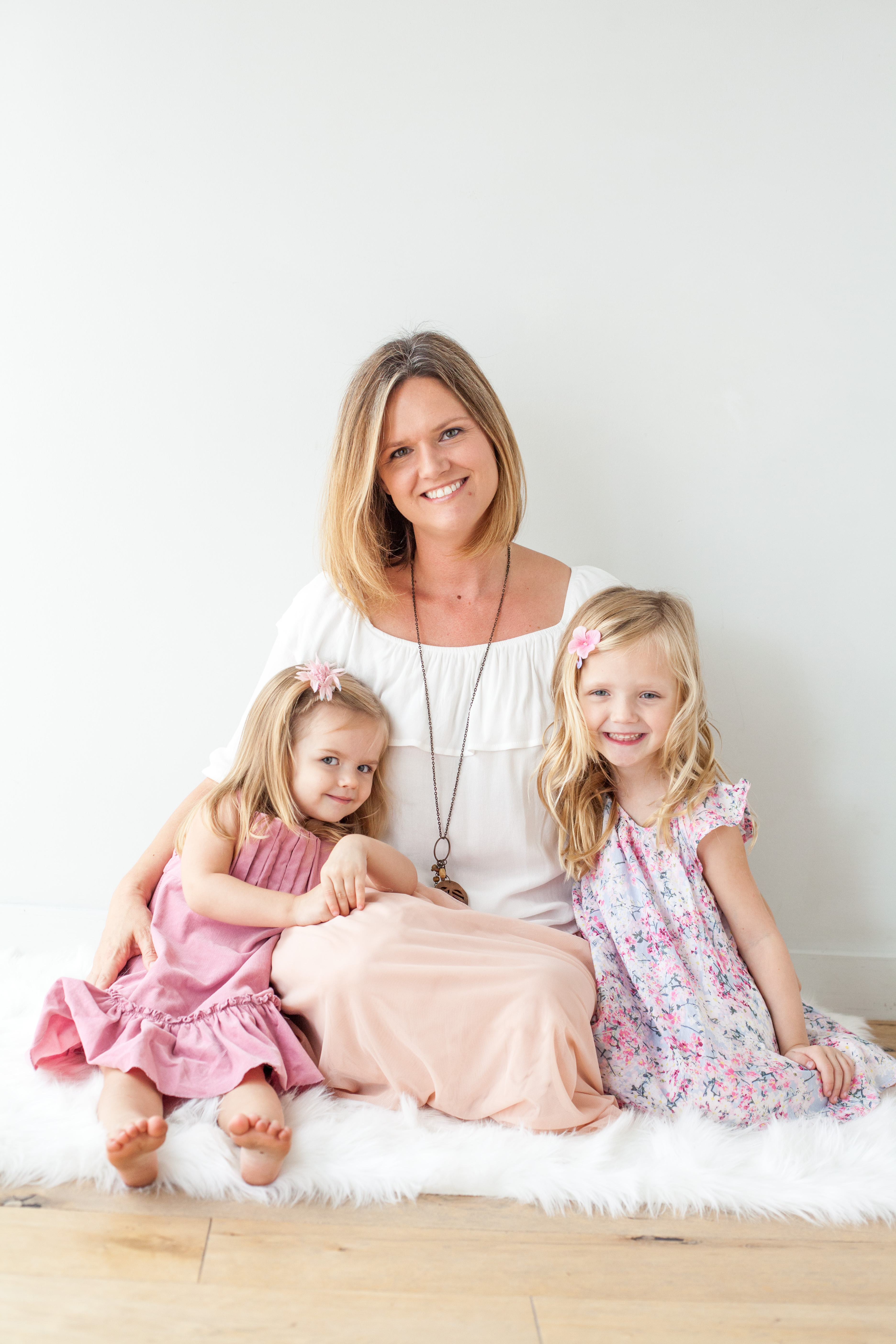 A mother sits with her daughters  | Alex Karl Photography | Palm Beach Family Photographer