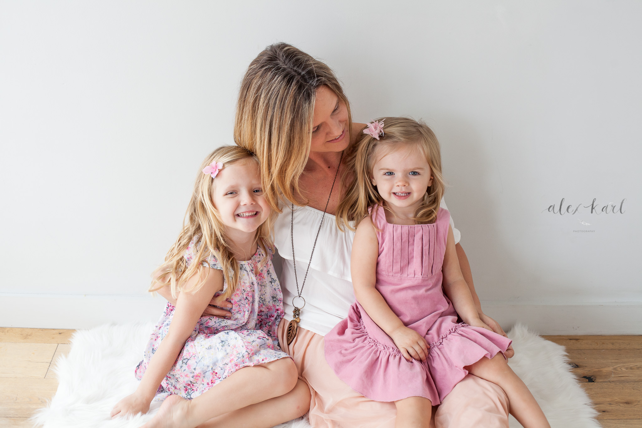 A mother laughs with her girls  | Alex Karl Photography | Palm Beach Family Photographer