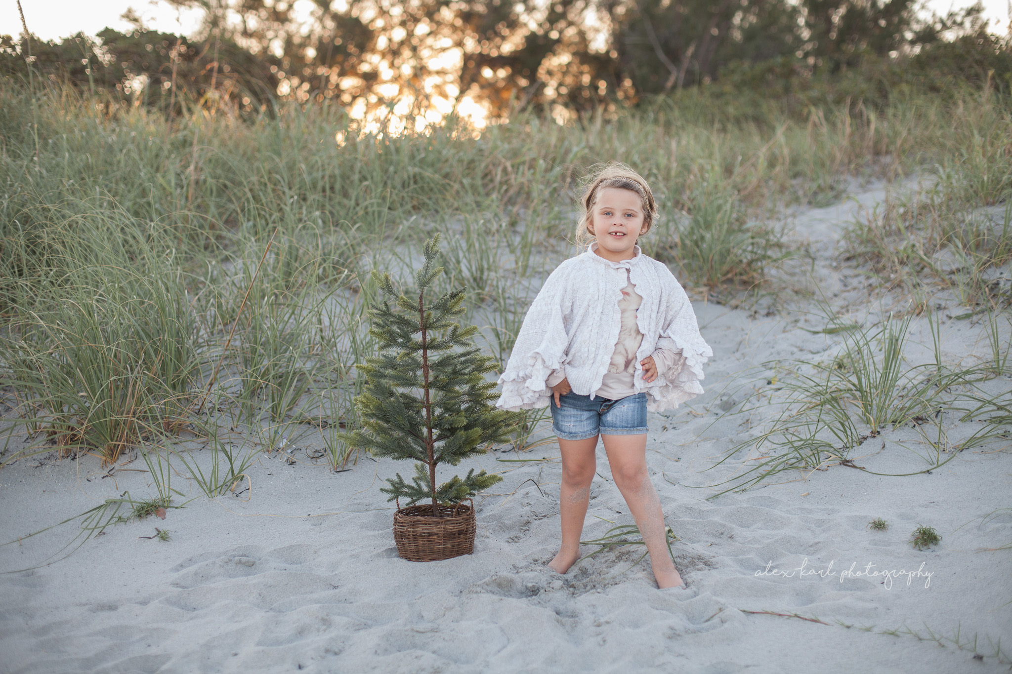 A girl stands by a tree | Alex Karl Photography | Palm Beach Family Photographer