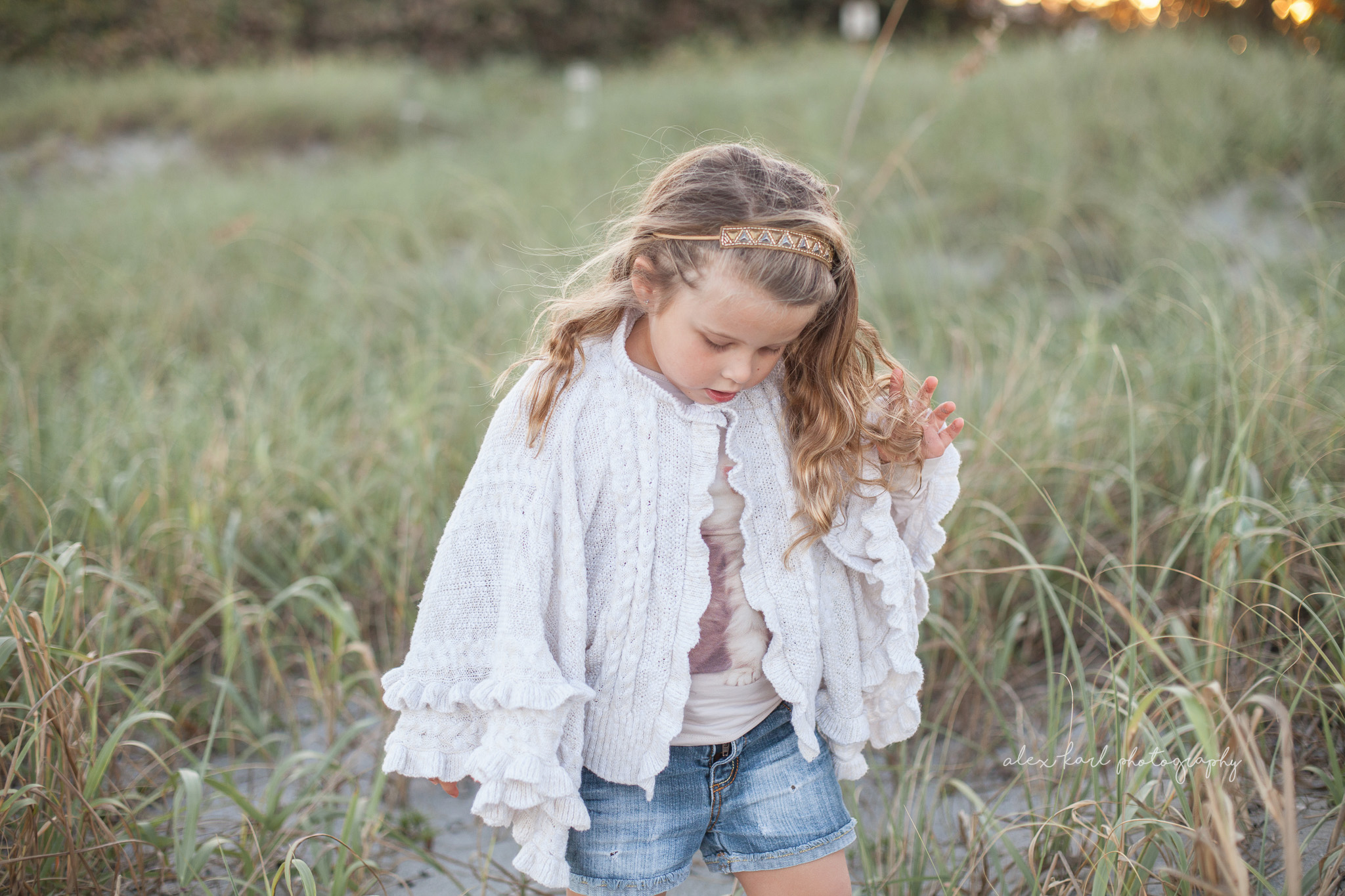 A girl plays with her hair | Alex Karl Photography | Palm Beach Family Photographer
