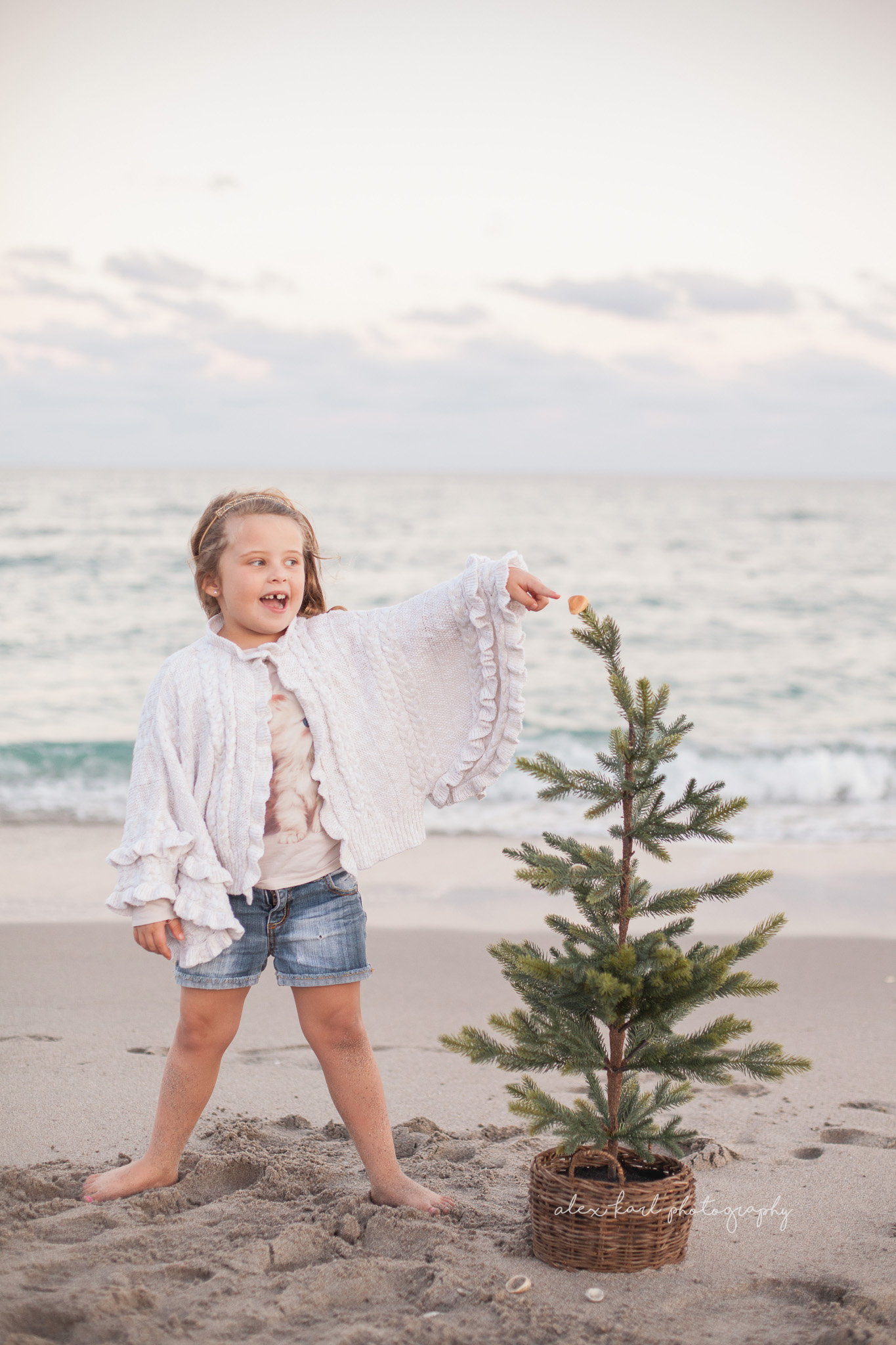 A girl touches a tree | Alex Karl Photography | Palm Beach Family Photographer