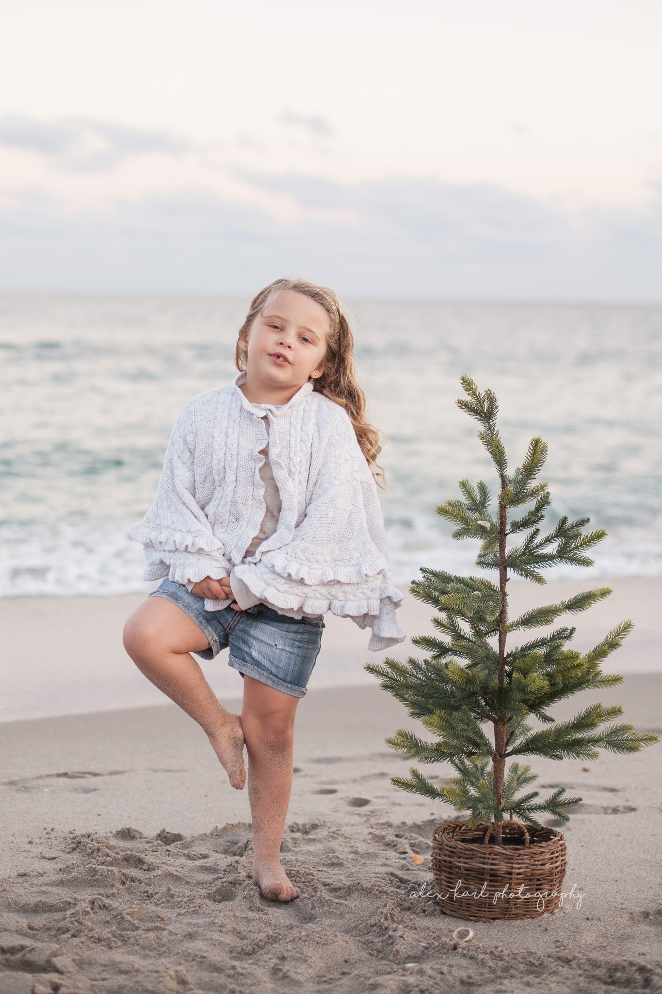 A girl stands on one foot | Alex Karl Photography | Palm Beach Family Photographer