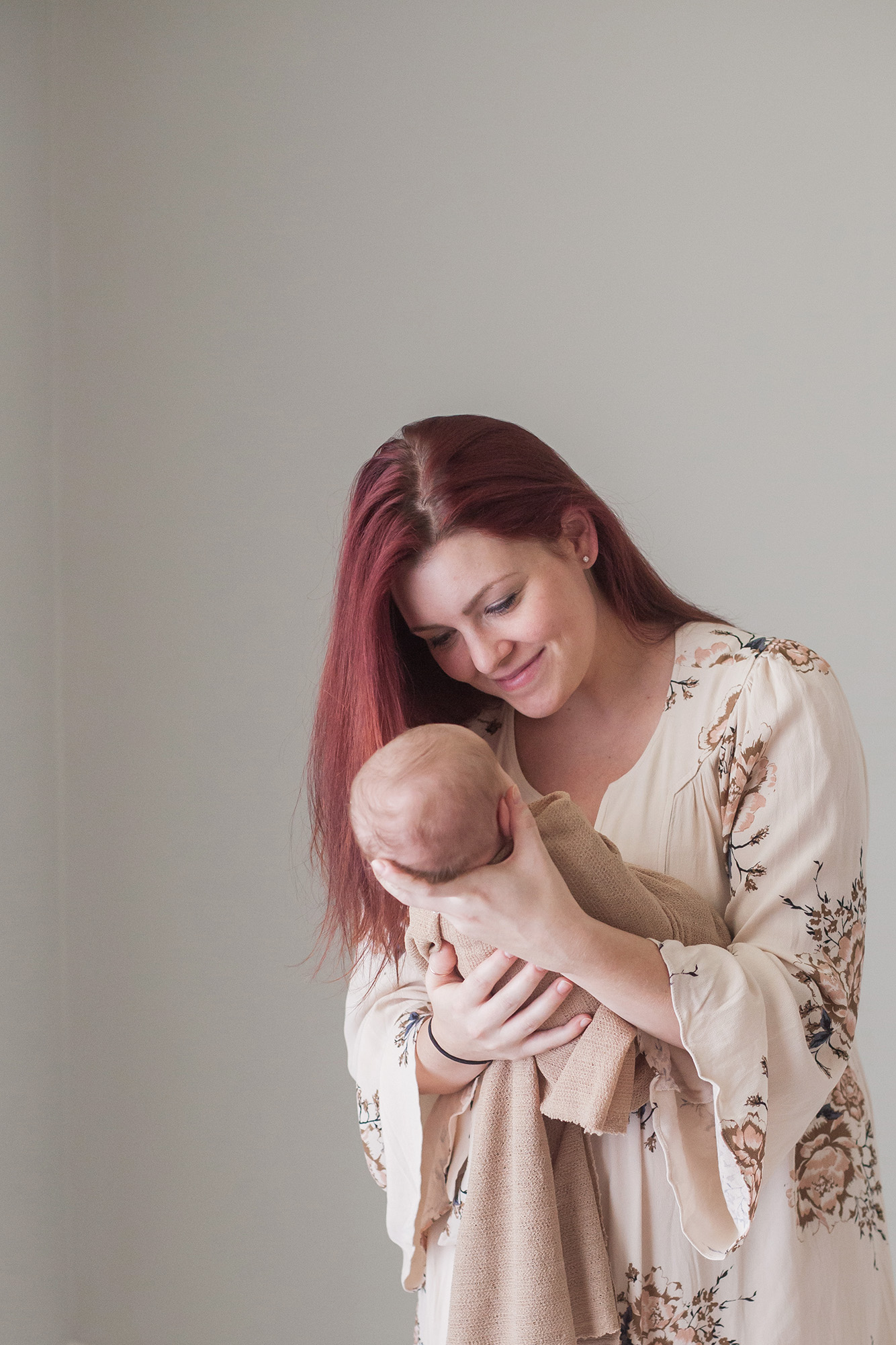 A mother smiles at her baby | Alex Karl Photography | Palm Beach Newborn Photographer