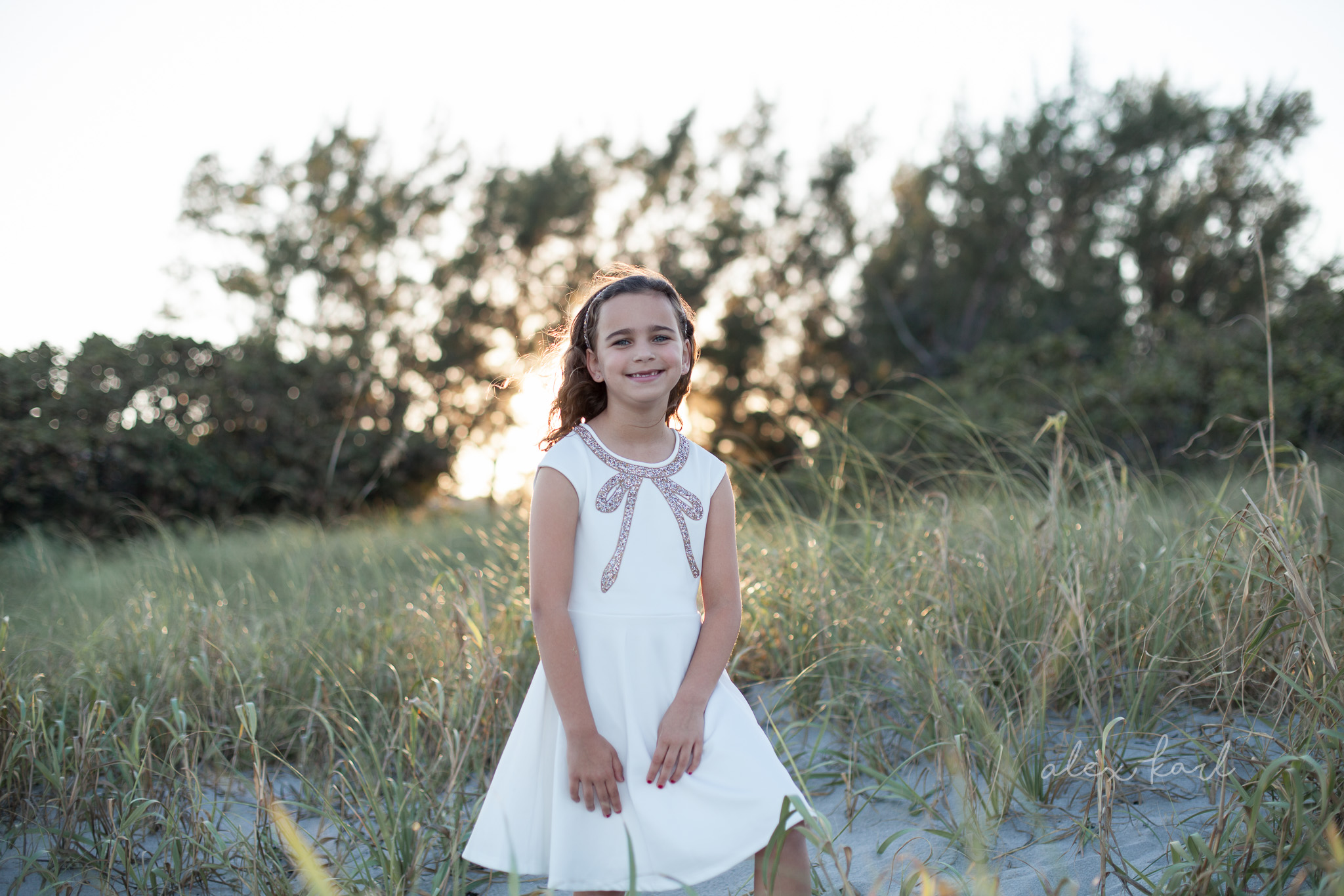 A girl smiles | Alex Karl Photography | Palm Beach Family Photographer