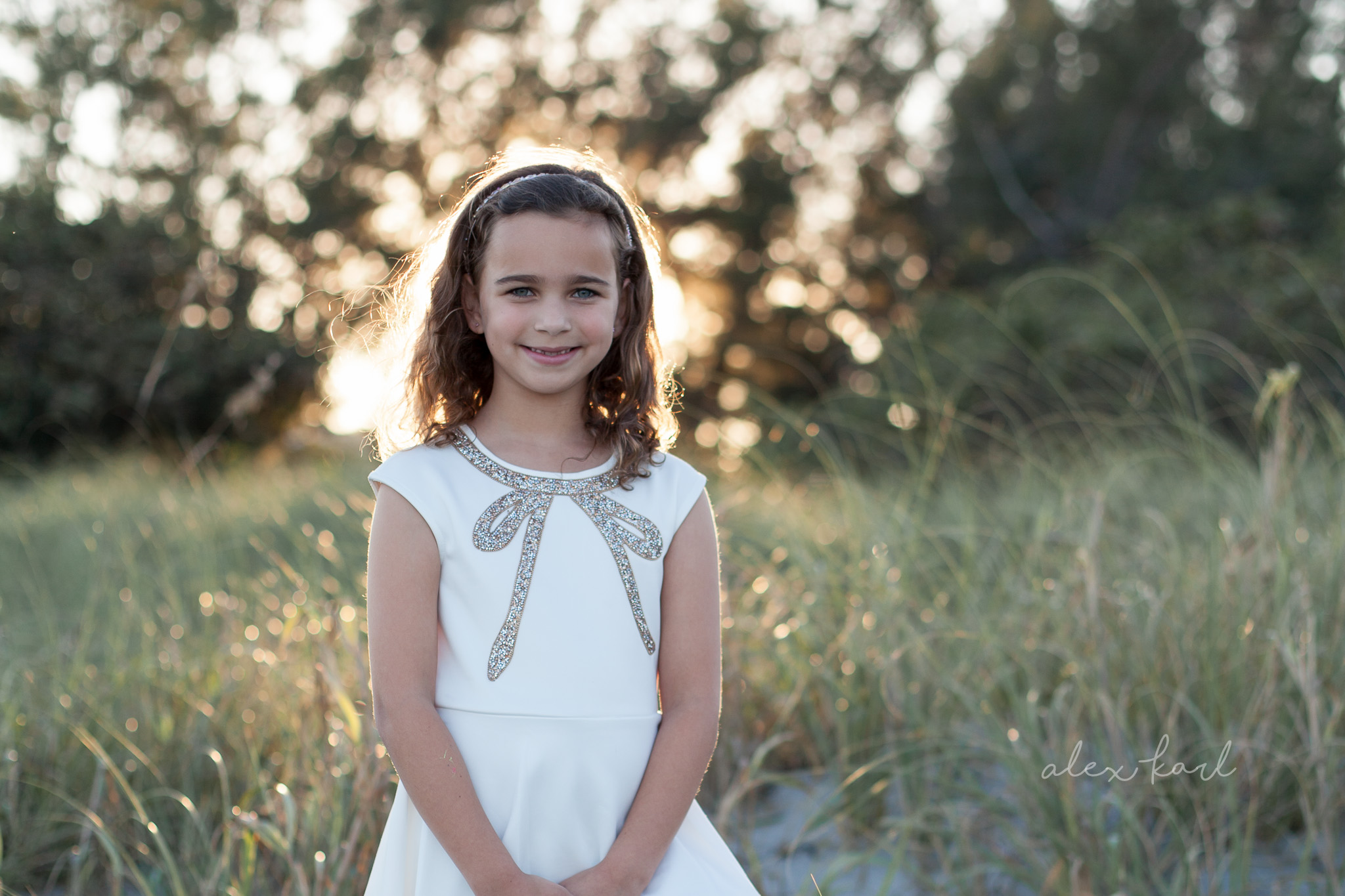 A little girl smiles sweetly | Alex Karl Photography | Palm Beach Family Photographer