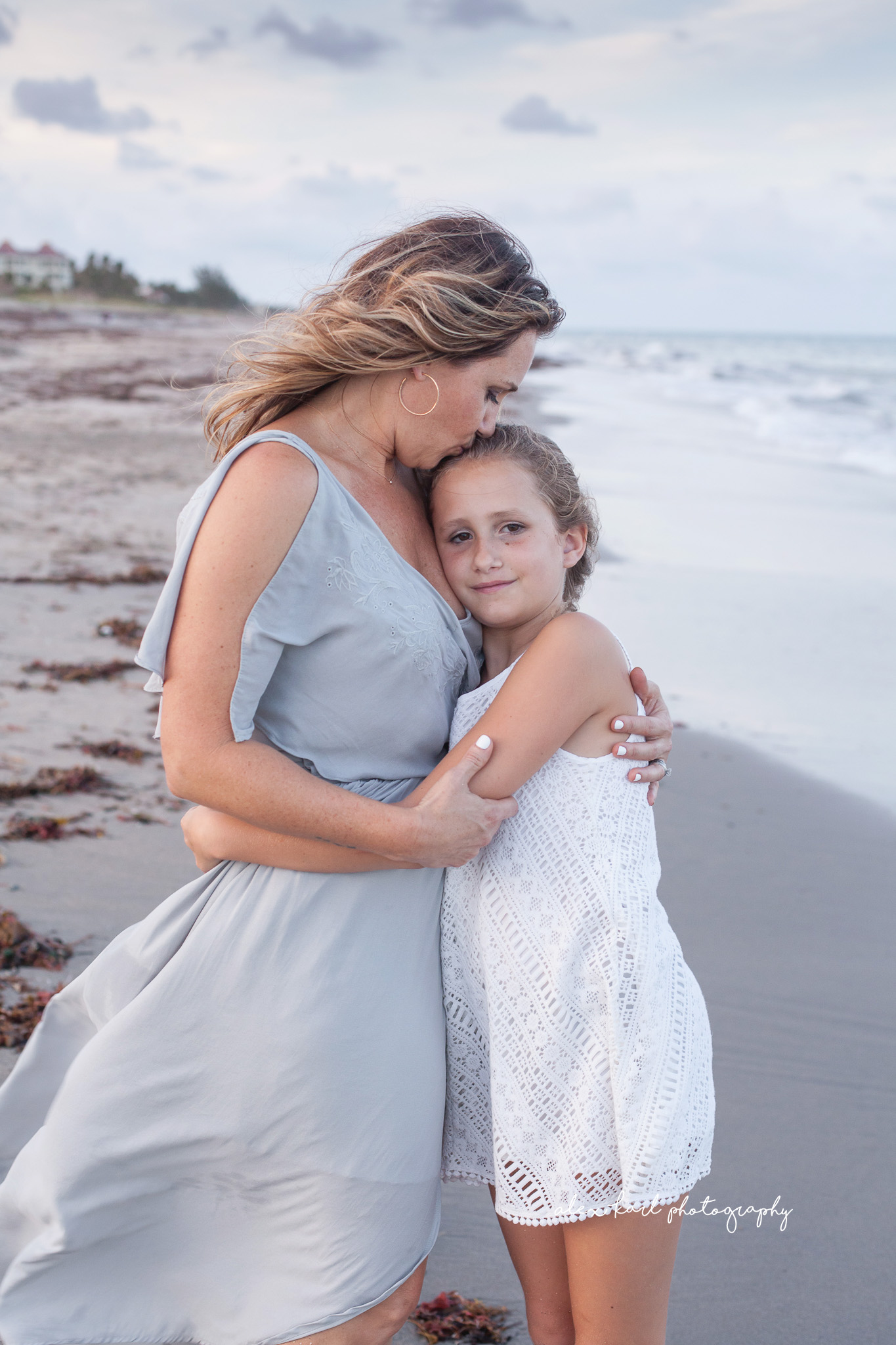 A mother embraces her daughter  | Alex Karl Photography | Palm Beach Family Photographer