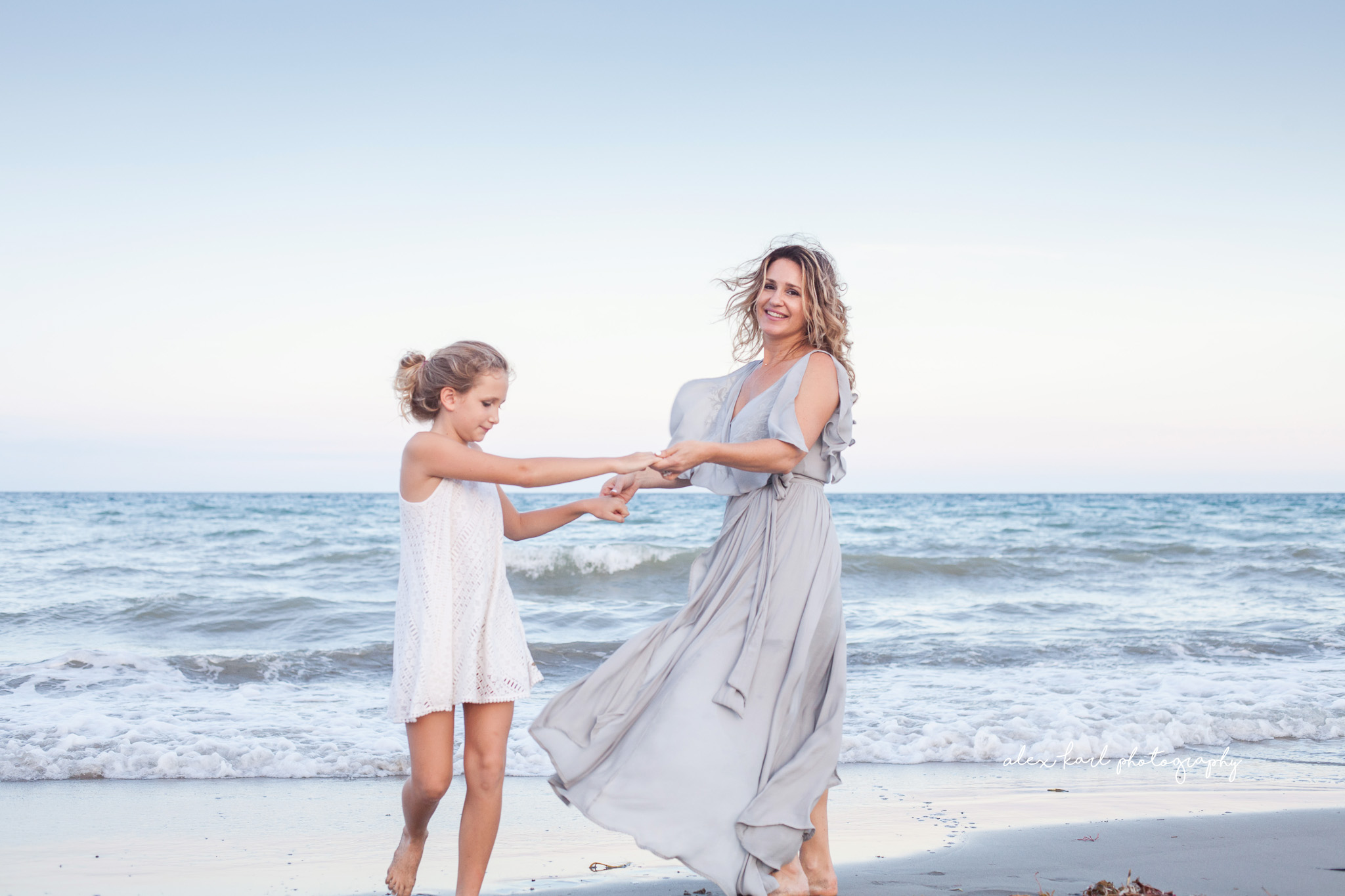A mother and daughter spin  | Alex Karl Photography | Palm Beach Family Photographer