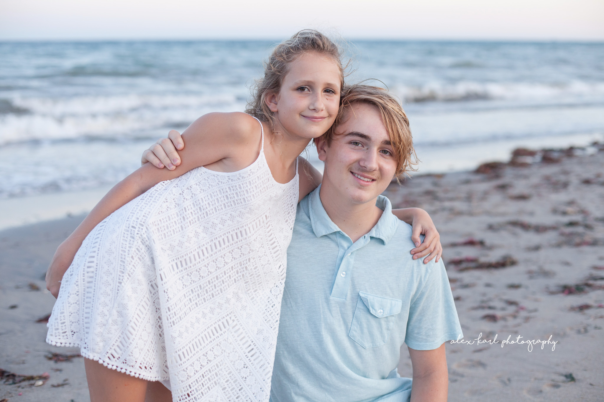 A brother hugs his sister  | Alex Karl Photography | Palm Beach Family Photographer