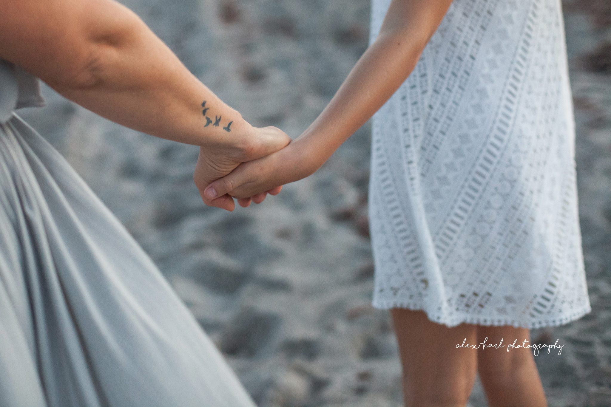 A woman holds hands with her daughter  | Alex Karl Photography | Palm Beach Family Photographer